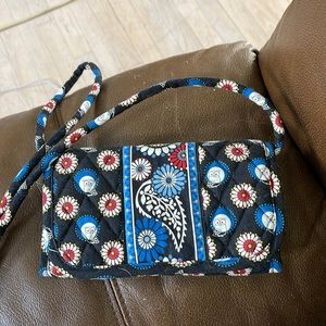 Never used , Vera Bradley, clutch or use strap and crossbody